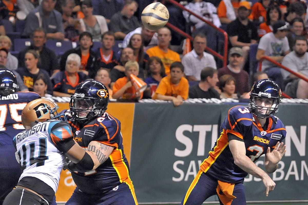 Spokane Shock quarterback Kyle Rowley, aided by solid protection from his line, throws a first-half touchdown to Shaun Kauleinamoku.  (Christopher Anderson)