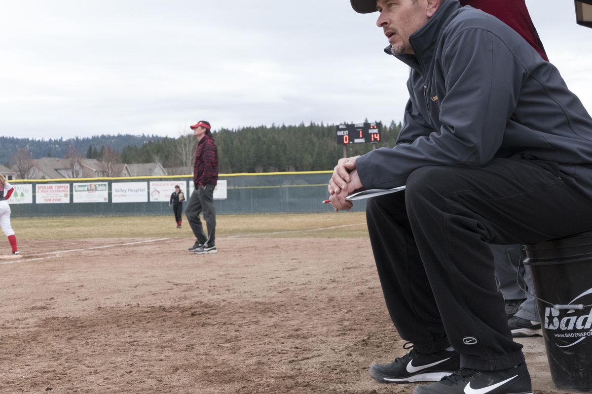 University High softball coach Jon Schuh is known for his attention to detail. (Jesse Tinsley / The Spokesman-Review)