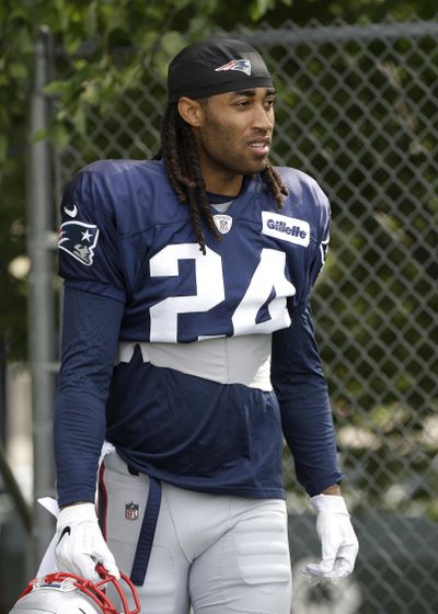 New England Patriots cornerback Stephon Gilmore steps on the field at the start of an NFL football training camp practice, Thursday, Aug. 1, 2019, in Foxborough, Mass. (Steven Senne / Associated Press)