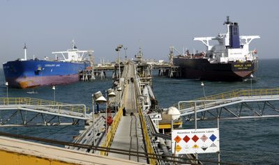 Oil tankers are filled in al-Bakir Harbor in Basra, Iraq,  in this 2007 file photo.  (Associated Press / The Spokesman-Review)