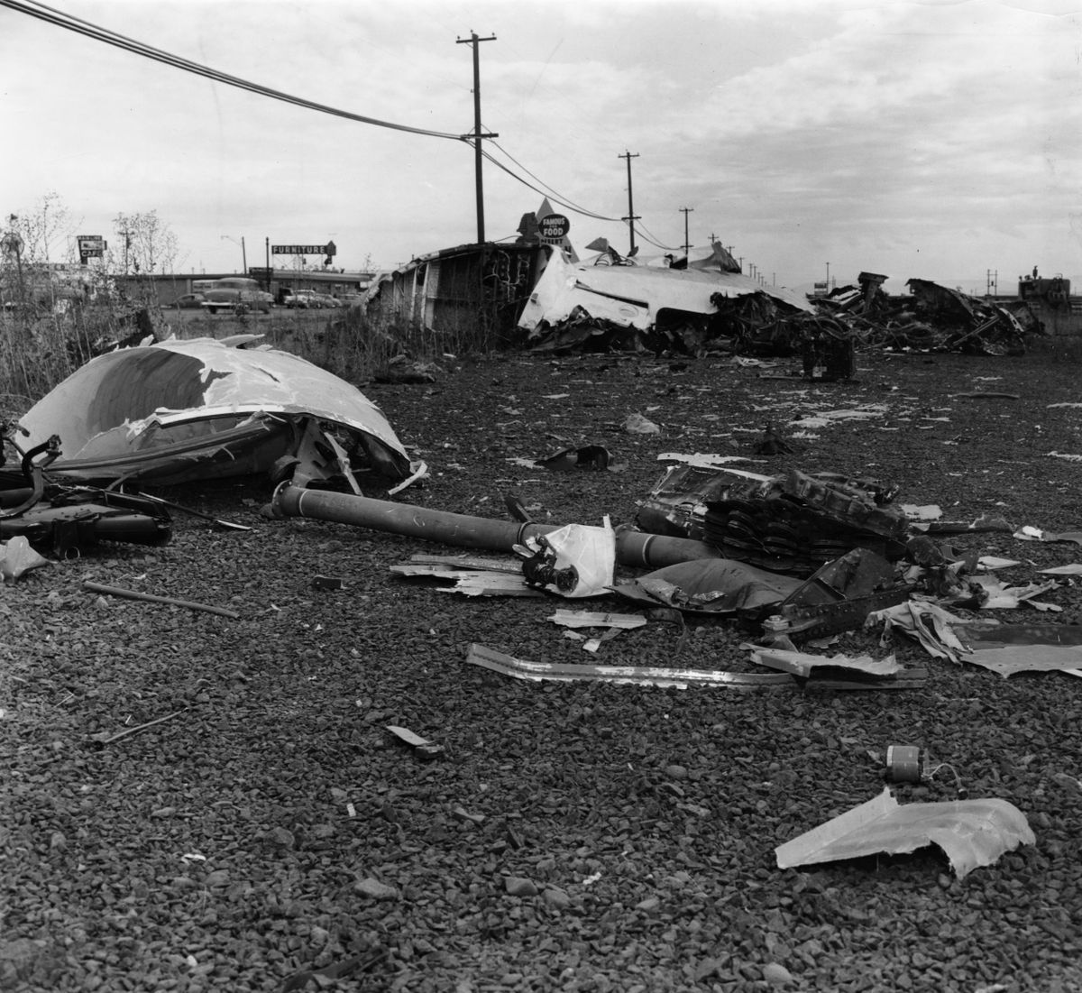 B-52 wreckage is strewn across a field after a collision near  Fairchild Air Force Base on Sept. 9, 1958. (File / The Spokesman-Review)