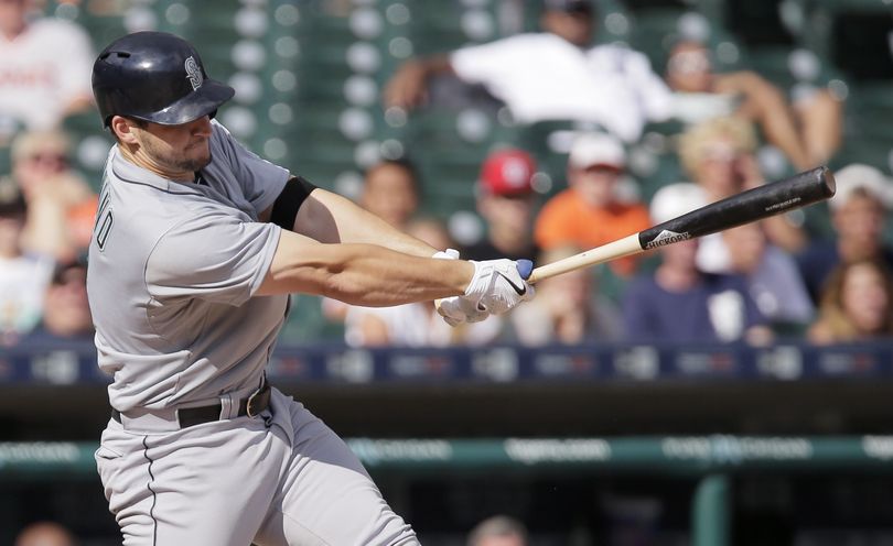 Mariners catcher Mike Zunino rips a double to left field to score Chris Taylor and put Seattle ahead in the 12th inning. (Associated Press)