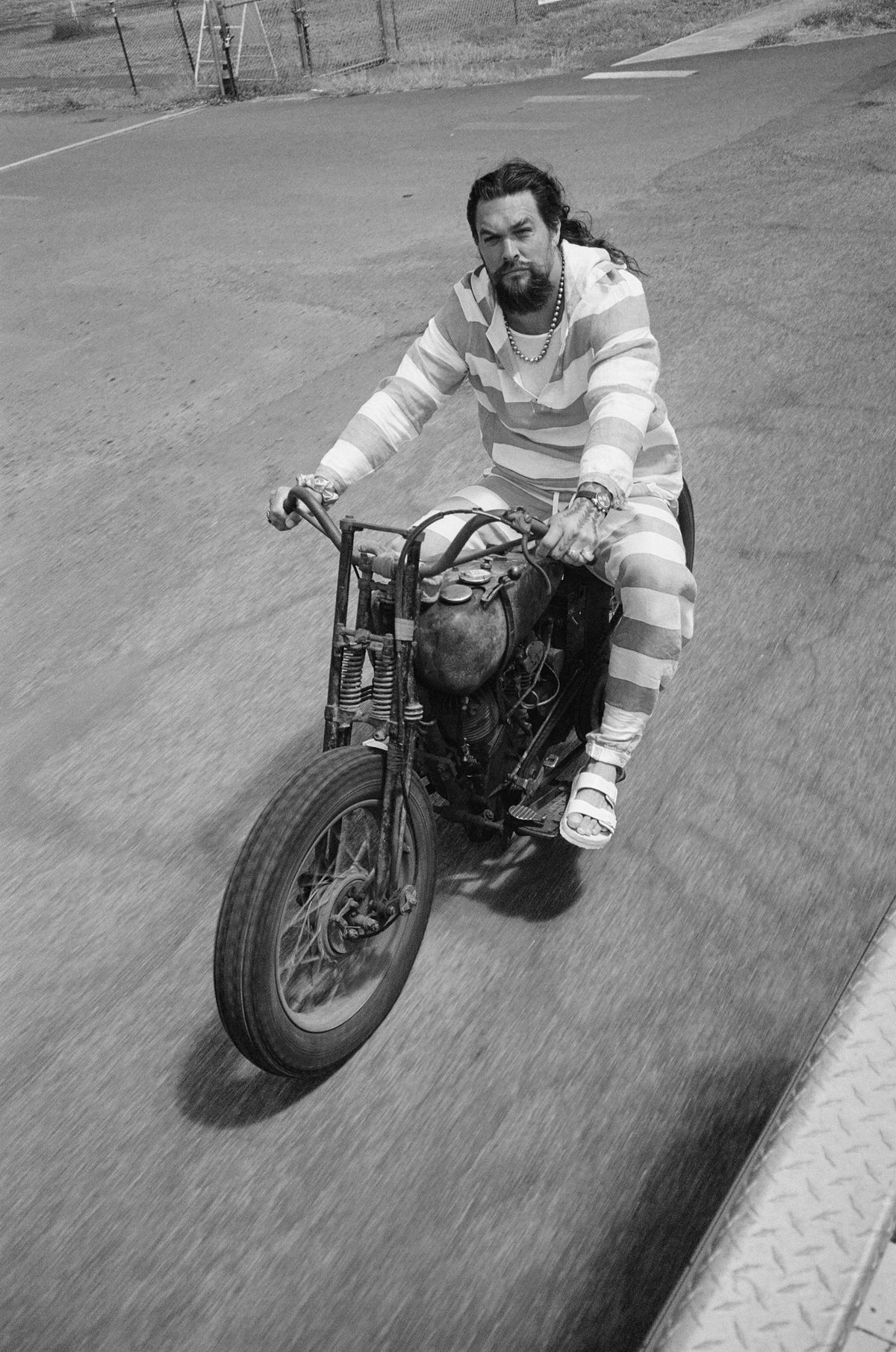 Jason Momoa rides his motorcycle in Oahu, Hawaii, on July 14. For “Chief of War,” the actor went from playing fictional superheroes to a real one in this epic passion project set in Hawaii.  (New York Times)