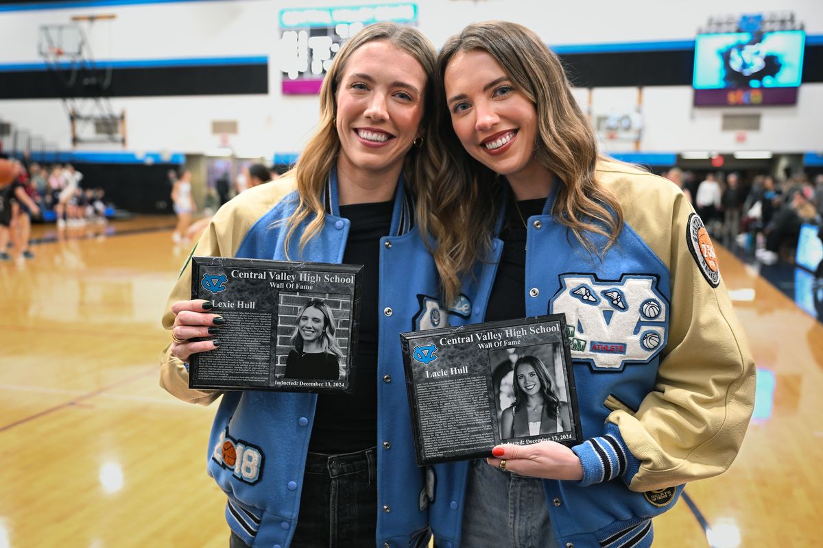 Former Central Valley girls basketball stars Lexie and Lacie Hull were inducted into the Central Valley Wall of Fame at half during at the CV vs Mt. Spokane basketball, game, Friday, Dec. 13, 2024, at Central Valley High School.  (COLIN MULVANY/THE SPOKESMAN-REVIEW)