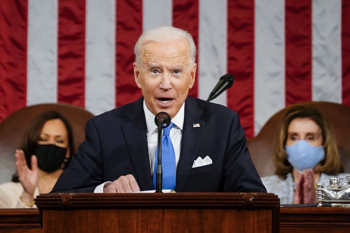 President Joe Biden addresses a joint session of Congress, Wednesday, April 28, 2021, in the House Chamber at the U.S. Capitol in Washington, as Vice President Kamala Harris, left, and House Speaker Nancy Pelosi of Calif., applaud.  (Melina Mara)