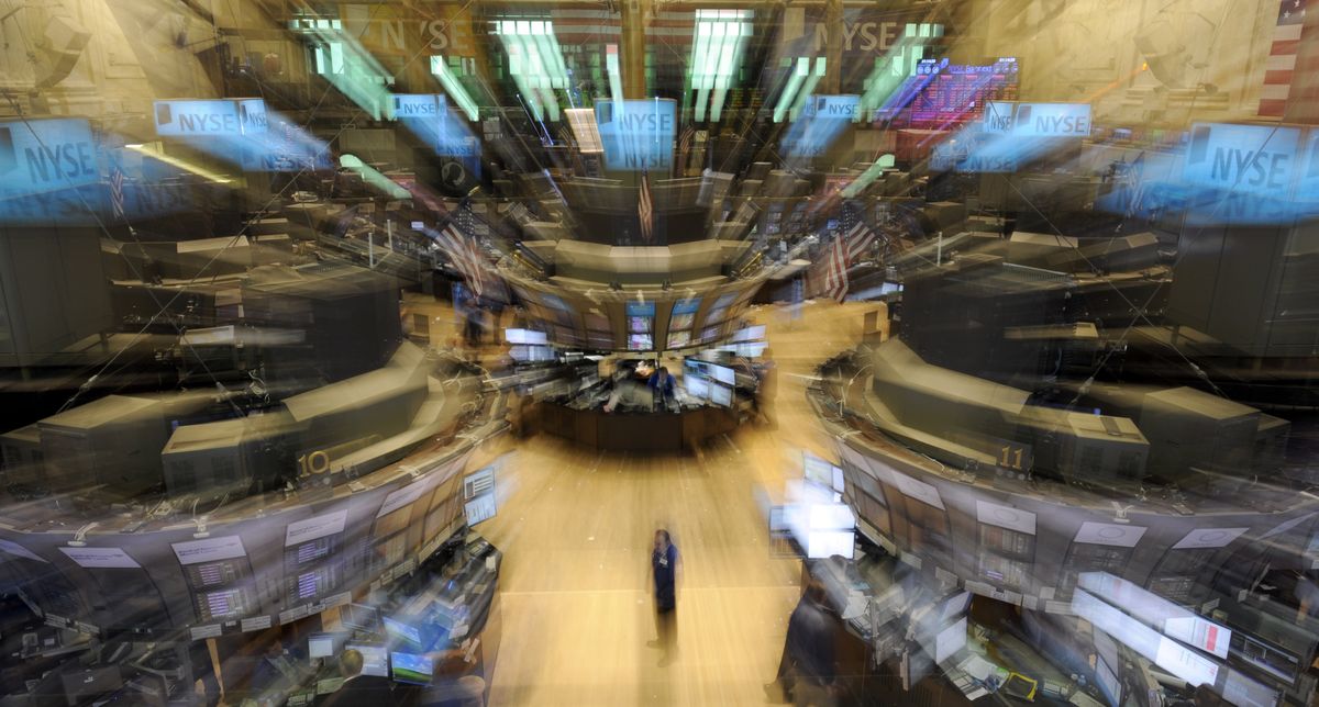  Traders work on the trading floor of the New York Stock Exchange on Aug. 19.  The market, as measured by the S&P 500 index, was down 5 percent in August and down 14 percent from its high in April. (Associated Press)