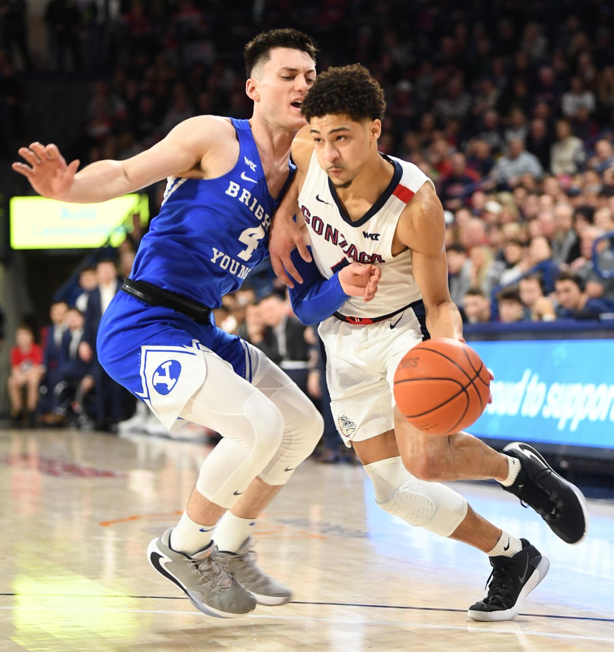 Gonzaga’s Ryan Woolridge (4), right, drives against Brigham Young University’s Alex Barcello (4) in the first half of action Saturday, Jan. 18, 2020 at the McCarthey Athletic Center at Gonzaga University in Spokane, Washington. The Zags led 38-31 at the half.  Jesse Tinsley/THE SPOKESMAN-REVIEW (Jesse Tinsley / The Spokesman-Review)