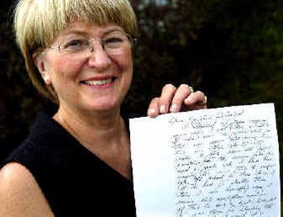 
Former Keystone Elementary Principal Karen Toreson holds a copy of former student Ken Coman's letter. 
 (Holly Pickett / The Spokesman-Review)