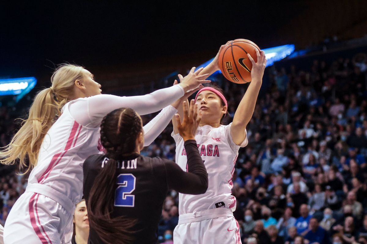 Gonzaga Bulldogs guard Kaylynne Truong (14) grabs a rebound during a game against BYU Cougars at the Marriott Center in Provo on Saturday, Feb. 19, 2022.  (Mengshin Lin, Deseret News)