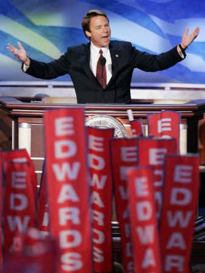 Presumptive Democratic vice presidential nominee Sen. John Edwards gestures during his convention address in Boston on Wednesday.
(Associated Press / The Spokesman-Review)