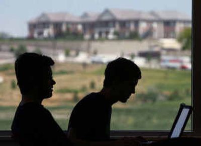 
Northface University students work on their project last week. The for-profit school dedicated to educating software developers has attracted the support of IBM Corp. and Microsoft Corp. and hopes to churn out 1,200 graduates a year. 
 (Associated Press photos / The Spokesman-Review)