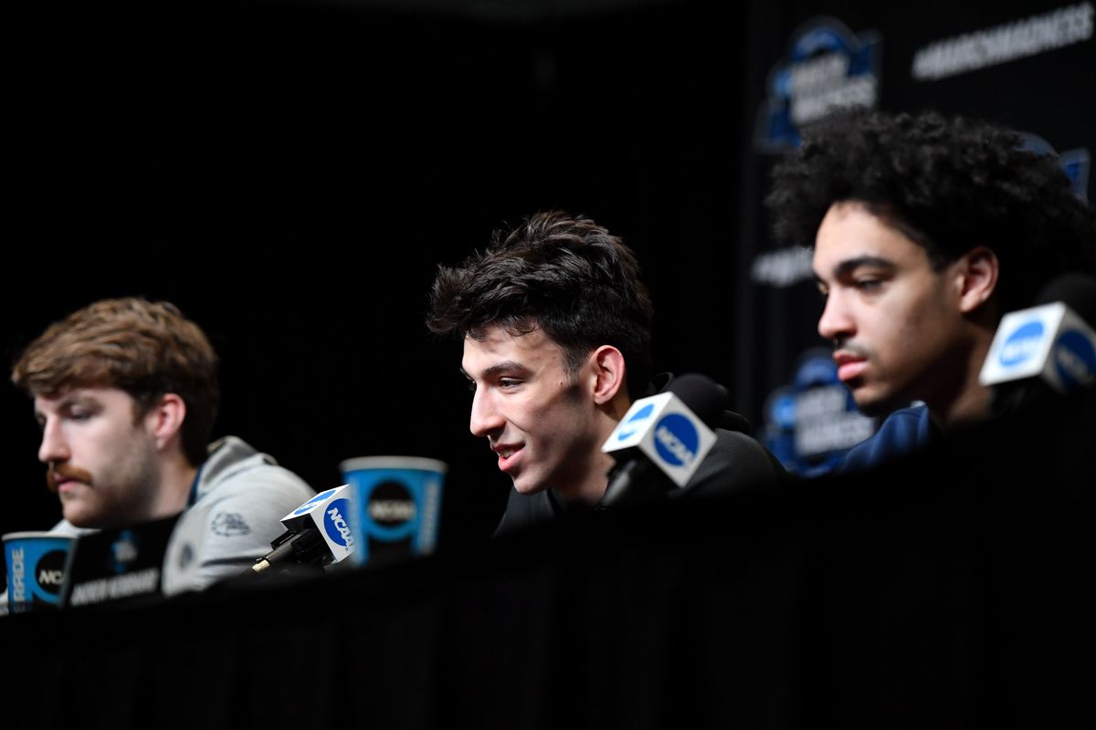 Gonzaga forward Chet Holmgren (middle), flanked by Drew Timme (left) and guard Andrew Nembhard (right) speaks to the media prior to a Sweet 16 game vs. Arkansas.  (Tyler Tjomsland/The Spokesman-Review)