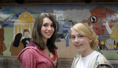 
Shaw Middle School students Aley, left, and Sydney Roberts pledged to earn good grades and stay out of trouble to secure college scholarships.
 (CHRISTOPHER ANDERSON / The Spokesman-Review)