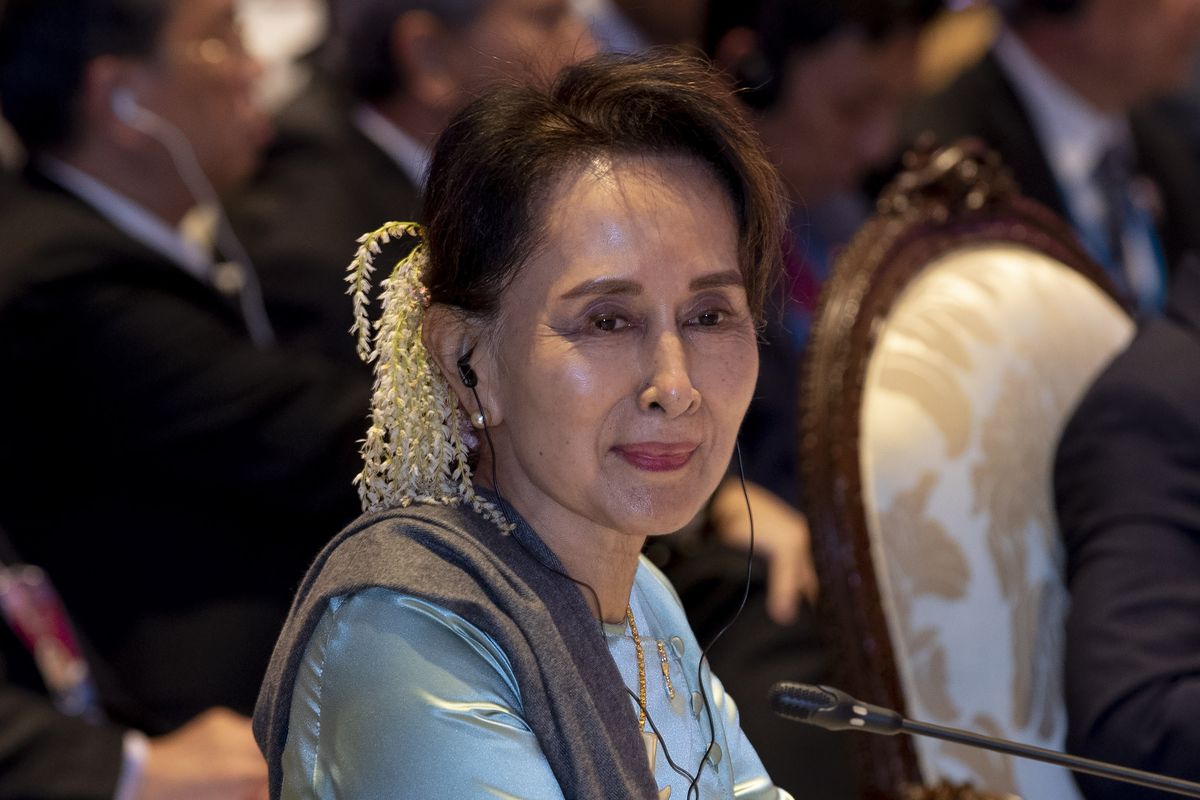 FILE - Myanmar leader Aung San Suu Kyi participates in the ASEAN-Japan summit in Nonthaburi, Thailand on Nov. 4, 2019. A legal official says ousted Myanmar leader Aung San Suu Kyi has been sentenced to 5 years in prison in the first of several corruption cases.  (Gemunu Amarasinghe)