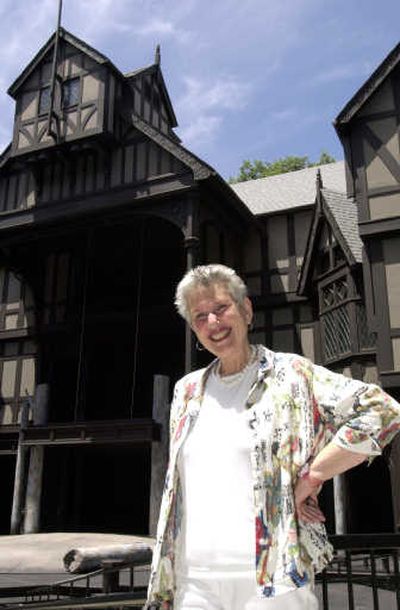 Libby Appel stands in front of the set of 