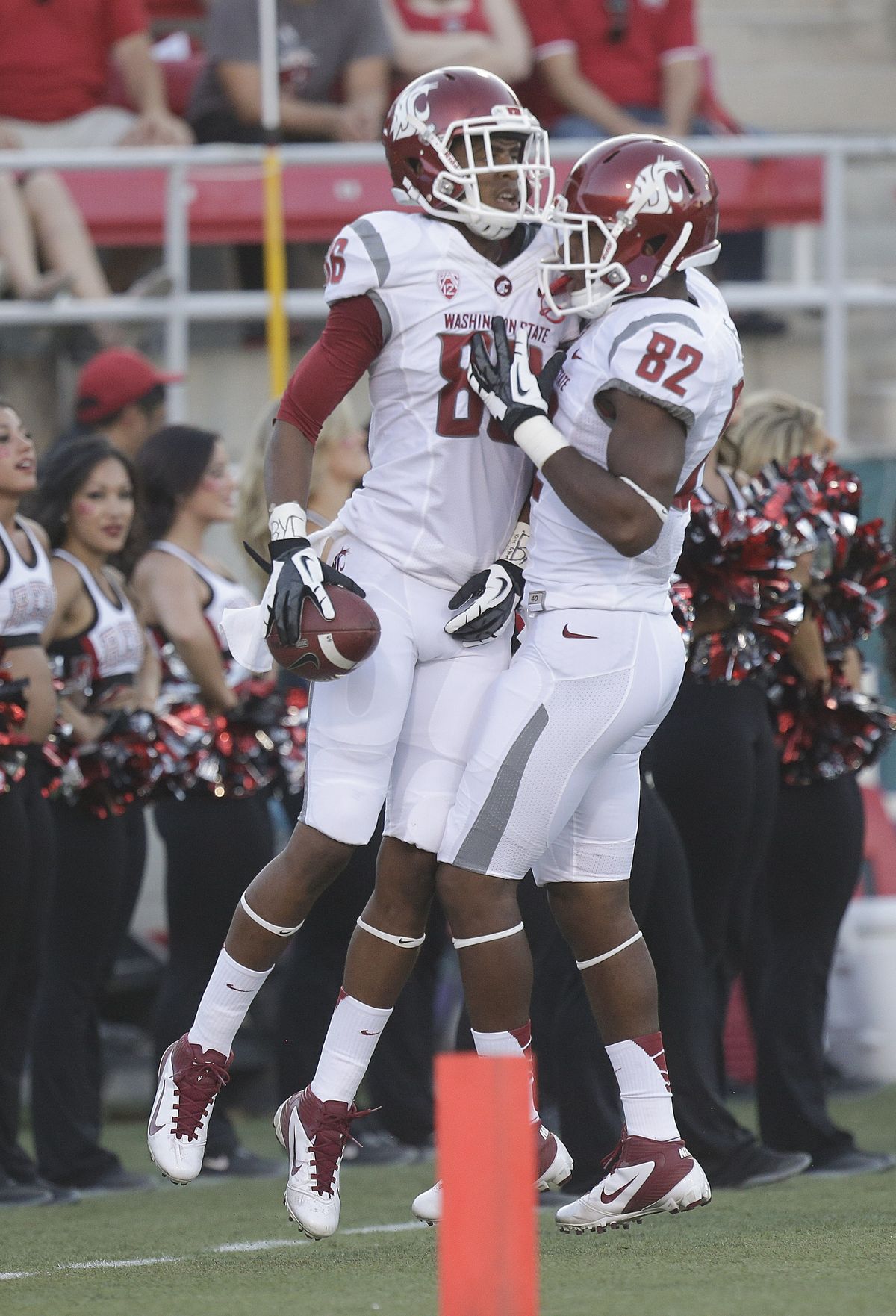 Marquess Wilson celebrates his TD with Bobby Ratliff, right. (Associated Press)