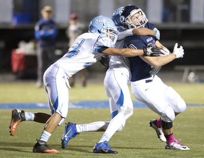 Gonzaga Prep’s Nick Johnson, right, is corralled by Central Valley defenders Adam Alvarez, left, and Terrell Harrison. Johnson scored twice in the victory. (Jesse Tinsley)