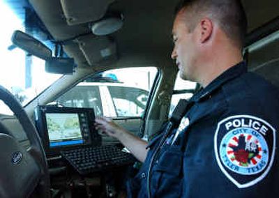 Officer John Weaver of the Tyler Police Department reviews a traffic stop he made earlier in the day using the Coban digital video camera system in Tyler, Texas.
(Associated Press / The Spokesman-Review)