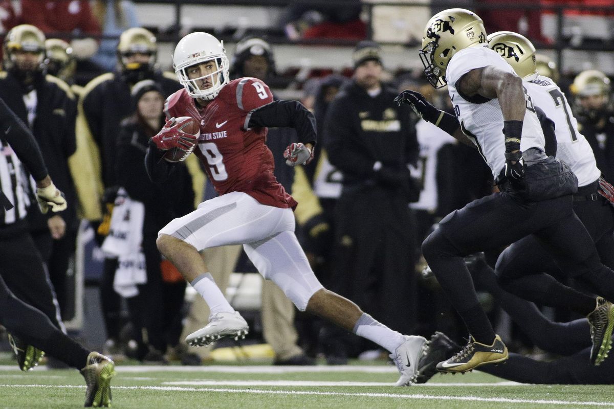 Washington State wide receiver Gabe Marks (9) runs with the ball while being pursued by Colorado linebacker Kenneth Olugbode, center, and defensive back Nick Fisher during the second half of an NCAA college football game, Saturday, Nov. 21, 2015, in Pullman. WSU won 27-3. (Young Kwak / Associated Press)