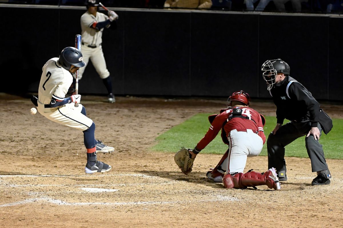 Gonzaga shortstop Savier Pinales (2) is hit by a WSU pitch as he attempted a bunt with bases loaded. He advanced to first and the runner at third scored for the Zags in the bottom of the 6th inning, Tuesday, April 5, 2022, at Gonzaga University.  (COLIN MULVANY/THE SPOKESMAN-REVIEW)