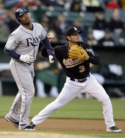 Athletics third baseman Eric Chavez is ailing again.  (Associated Press / The Spokesman-Review)