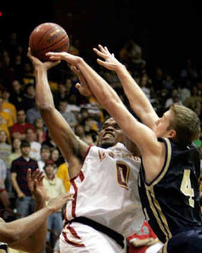 
Winthrop's James Shuler (0) is a versatile performer, averaging 12.1 points, 4.3 rebounds and 3.1 assists per game.
 (Associated Press / The Spokesman-Review)