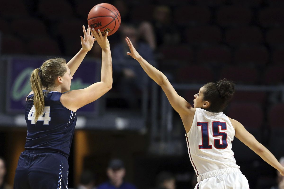 Gonzaga’s Jessie Loera  defends a shot by San Diego’s Sydney Williams  during the first half of Tuesday’s West Coast Conference title game in Las Vegas. (Isaac Brekken / AP)