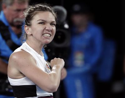 Romania’s Simona Halep celebrates after defeating United States’ Sofia Kenin in their second round match at the Australian Open tennis championships in Melbourne, Australia, Thursday, Jan. 17, 2019. (Aaron Favila / Associated Press)