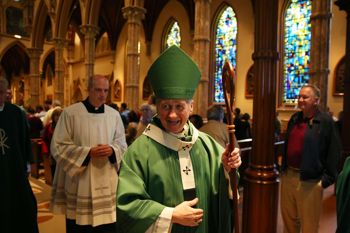 Archbishop Blase Cupich exits after celebrating mass on Sunday, Oct. 9, 2016, at Holy Name Cathedral in Chicago. The Vatican announced Sunday that Chicago Archbishop Cupich and Archbishop Joseph Tobin of Indianapolis will become cardinals in a Rome ceremony Nov. 19. (Chris Walker / Associated Press)