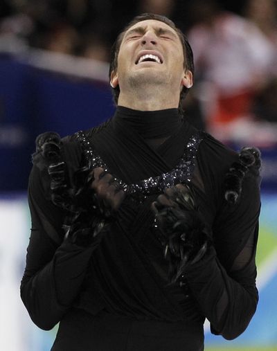 American Evan Lysacek reacts after his short program during the men’s figure skating competition.  (Associated Press)