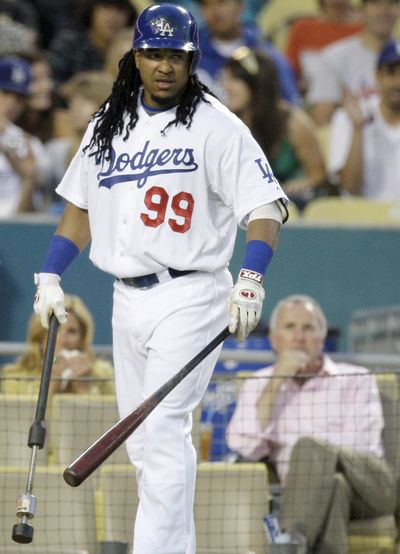 Manny Ramirez apologized to  Dodgers teammates.  (Associated Press / The Spokesman-Review)