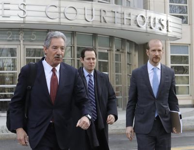 Lawyers for the Chinese electronics giant Huawei from left, James Cole, Michael Alexander Levy, and David Bitkower leave Brooklyn federal court in New York, Thursday March 14, 2019. Lawyers for Huawei entered a not-guilty plea in a U.S. case charging the company with violating Iran trade sanctions. (Bebeto Matthews / AP)