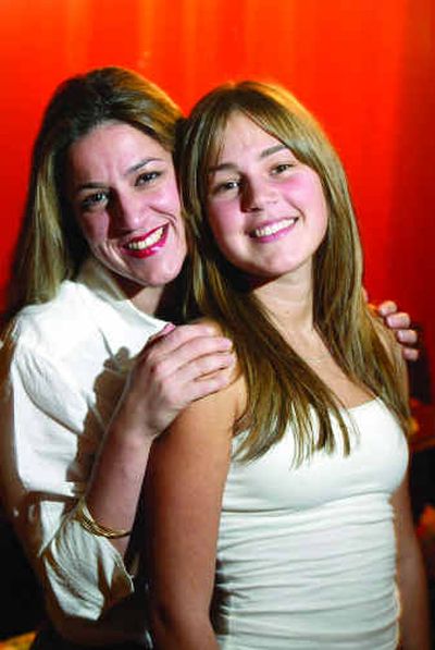 
Luly Martinez and her 17-year-old daughter, Alexa. Alexa wants breast implants but her mother wants her to stop growing before she agrees to the surgery. 
 (KRT / The Spokesman-Review)