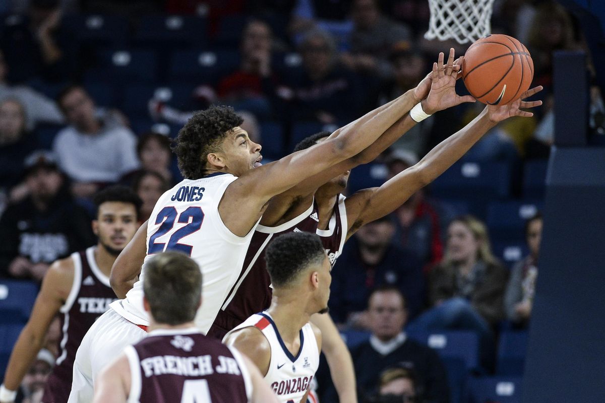 Gonzaga’s Jeremy Jones defends on Texas A&M forward John Walker III during a Nov. 15 home game. (Dan Pelle / The Spokesman-Review)