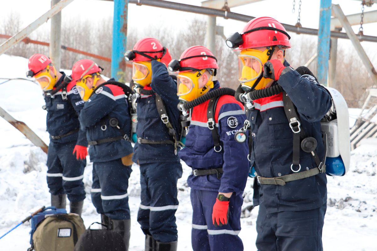 In this Russian Emergency Situations Ministry Thursday, Nov. 25, 2021 photo, rescuers prepare to work at a fire scene at a coal mine near the Siberian city of Kemerovo, about 3,000 kilometres (1,900 miles) east of Moscow, Russia,. Russian authorities say a fire at a coal mine in Siberia has killed nine people and injured 44 others. Dozens of others are still trapped. A Russian news agency says the blaze took place in the Kemerovo region in southwestern Siberia.  (HOGP)