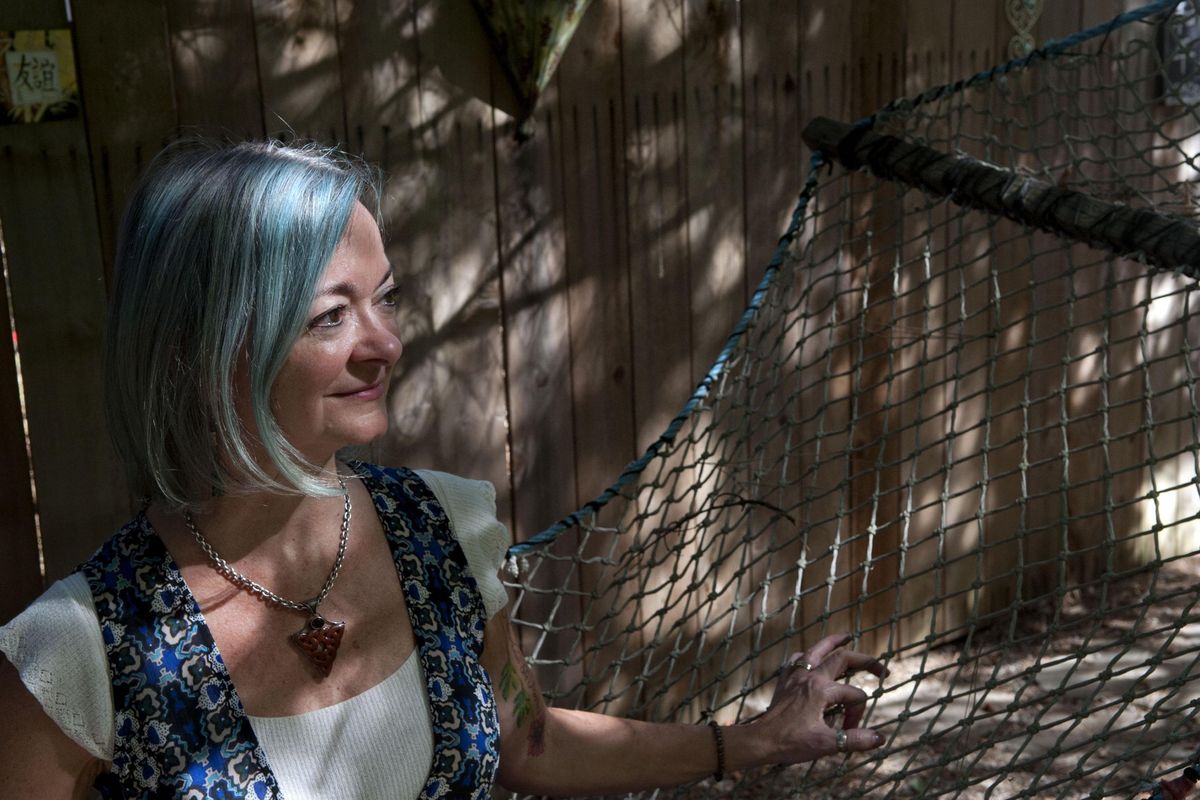 "I want to to pull people out of the flames," said Lorri Stonehocker about teaching a first-time class offered through Act 2 on Healthy Grieving at her home in Spokane Valley on Thursday, August 24, 2017. Her husband passed away in March 2016. (Kathy Plonka / The Spokesman-Review)