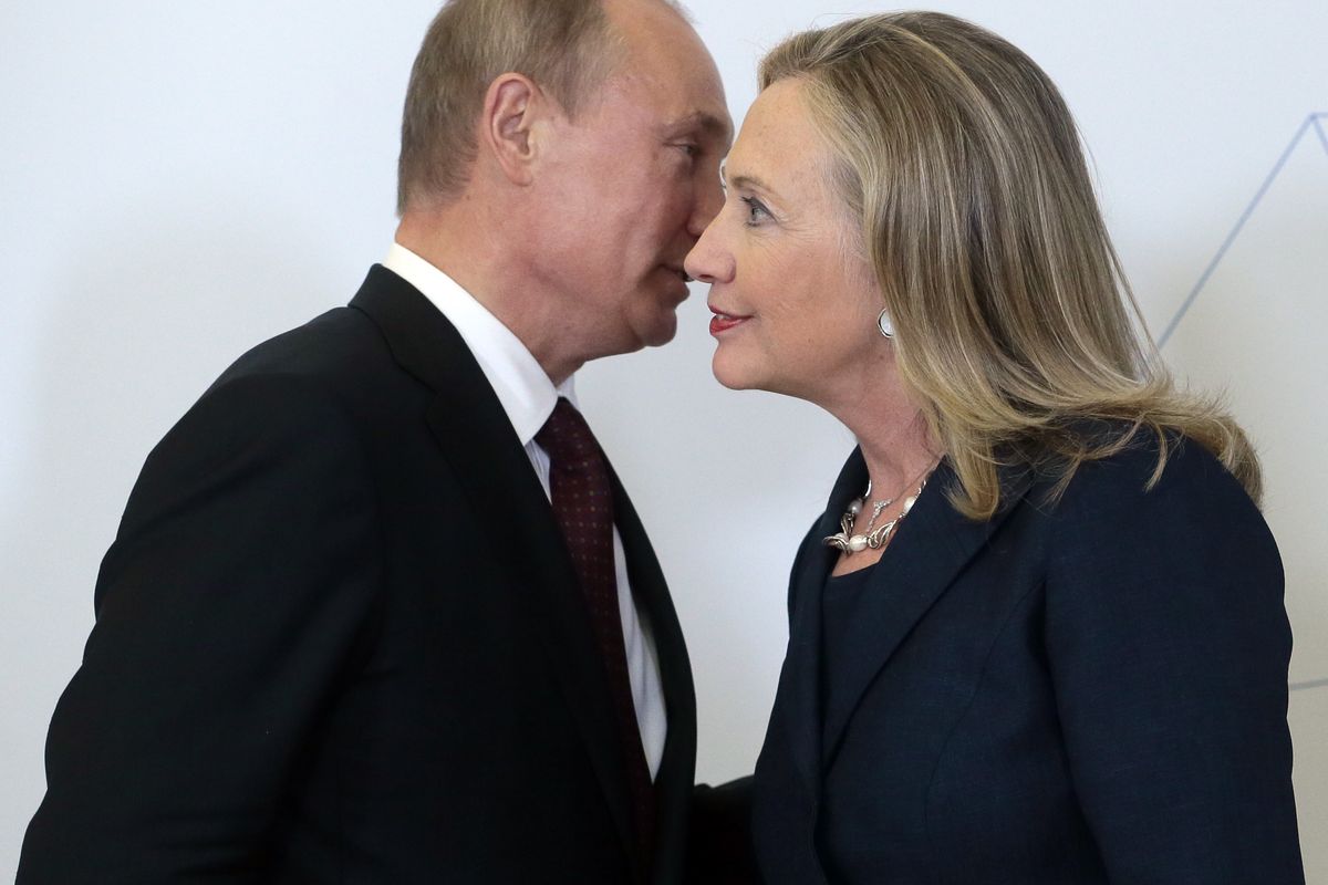 Russian President Vladimir Putin, left, meets U.S. Secretary of State Hillary Rodham Clinton on her arrival at the APEC summit in Vladivostok, Russia, Saturday, Sept. 8, 2012. (Mikhail Metzel / Associated Press)
