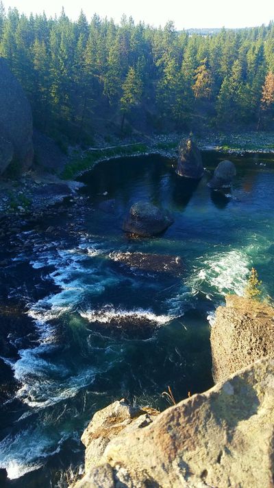 Blue Lagoon: Rapids descend from tranquil waters at Bowl and Pitcher within Riverside State Park. (Photo by Lisa Burk)