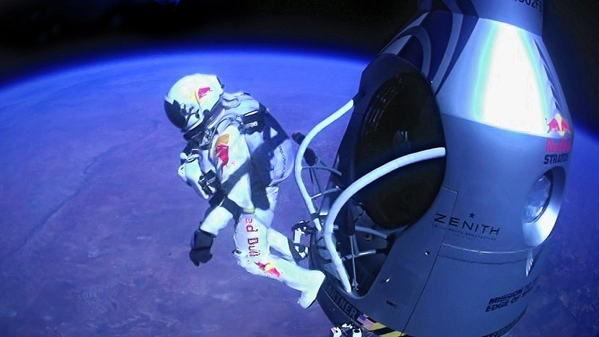 This image provided by Red Bull Stratos shows pilot Felix Baumgartner of Austria as he jumps out of the capsule during the final manned flight for Red Bull Stratos on Sunday, Oct. 14, 2012. In a giant leap from more than 24 miles up, Baumgartner shattered the sound barrier Sunday while making the highest jump ever � a tumbling, death-defying plunge from a balloon to a safe landing in the New Mexico desert. (Red Bull Stratos)