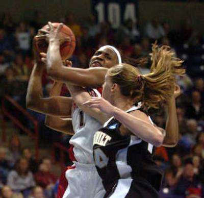 
Maryland's Crystal Langhorne tears a rebound away from Vanderbilt's Christina Wirth during Saturday's Sweet 16 game at the Arena. 
 (Jesse Tinsley / The Spokesman-Review)