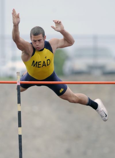 Mead's Braden Barranco clears the bar at 14-5 during the 3A and 4A regional track and field meet. (Matt Gade)