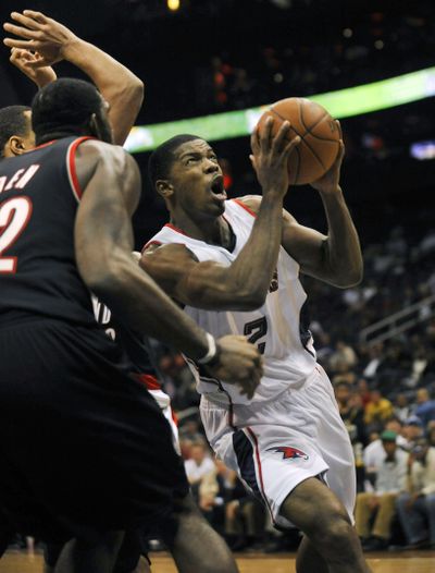 Atlanta guard Joe Johnson had eight points in overtime.  (Associated Press)