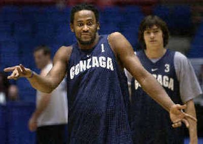 
Gonzaga University senior forward Ronny Turiaf clowns around with the team during their practice before today's first-round game against Winthrop. 
 (Brian Plonka / The Spokesman-Review)