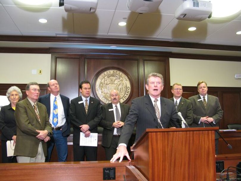 Gov. Butch Otter, joined by GOP legislative leaders and state budget officials, holds a news conference Thursday morning. (Betsy Russell)