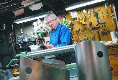 
Tom Dukich works in his South Hill shop on a stainless steel birdhouse. He makes the birdhouses and calls them a sculpture that birds use. 
 (photos by Jed Conklin/the spokesman-review / The Spokesman-Review)