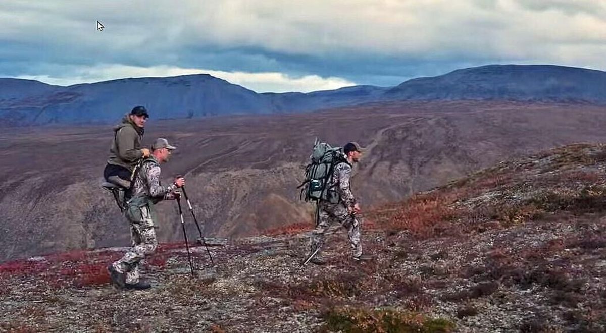 Outfitter and guide Cole Kramer carries his friend, Jonathon Blank, during a Dall sheep hunt in Canada’s Northwest Territory in August 2023.  (Screen grab, Sitka Films)