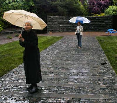 
Auschwitz survivor Alice Kern, left, and her daughter, Debbi Montrose, visit the Oregon Holocaust Memorial in Portland. 
 (Associated Press / The Spokesman-Review)