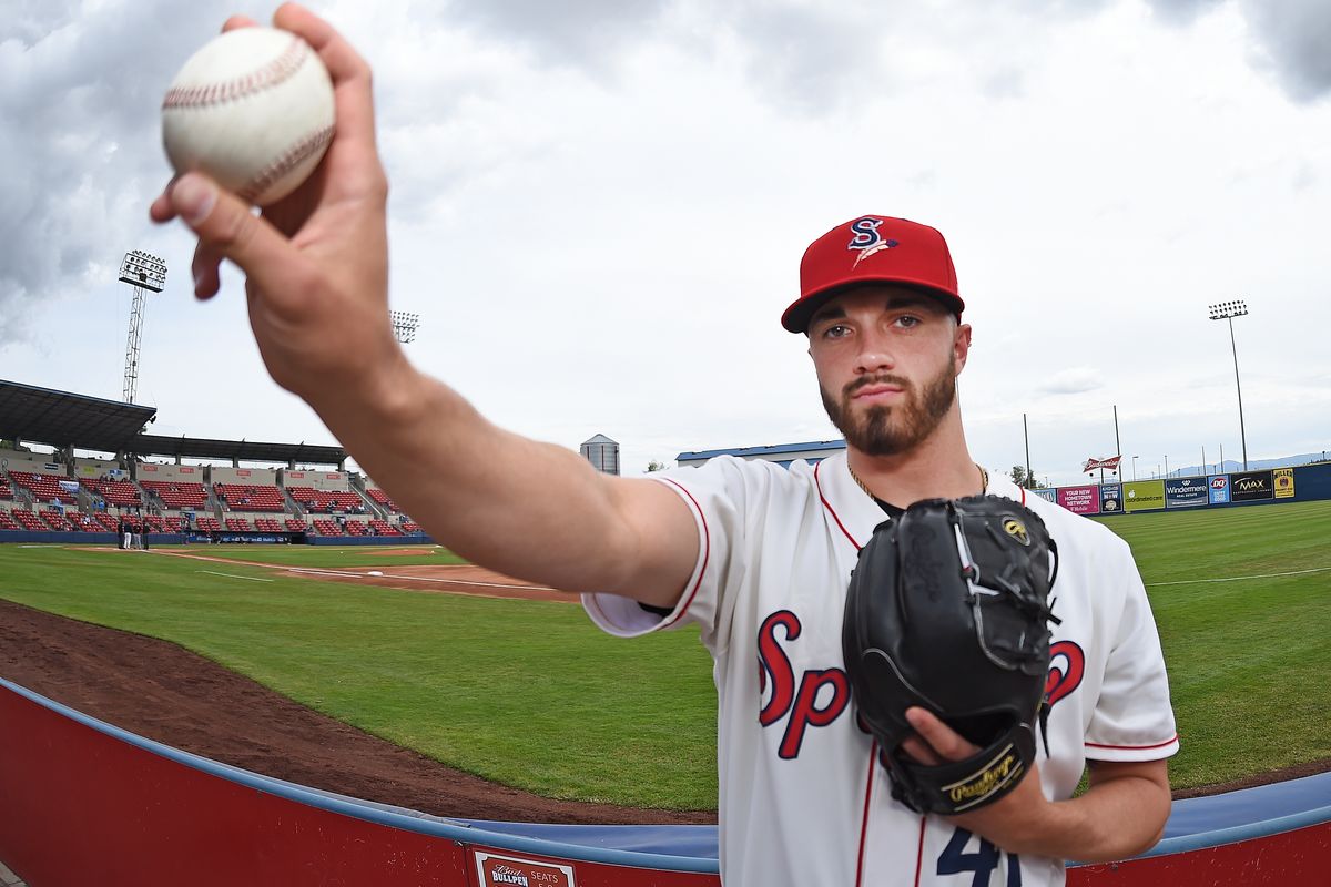 Spokane Indians reliever Dugan Darnell, shown in poses for an undated photo at Avista Stadium, once was out of baseball before catching on with an independent league team.  (James Snook/Spokane Indians)