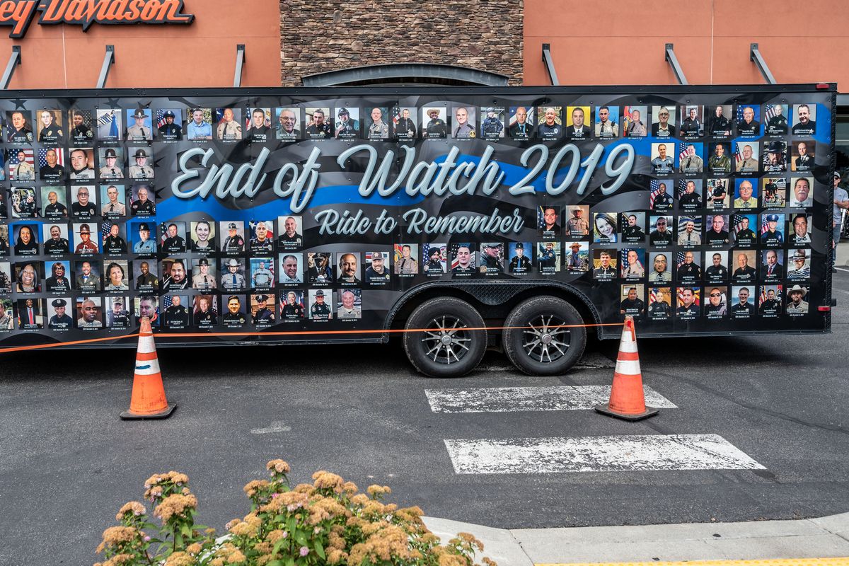 The End of Watch 2019 Ride to Remember support trailer featured the names of photos of 136 law enforcement officers across the country who died in the one of duty in 2019.  (Colin Mulvany/THE SPOKESMAN-REVIEW)