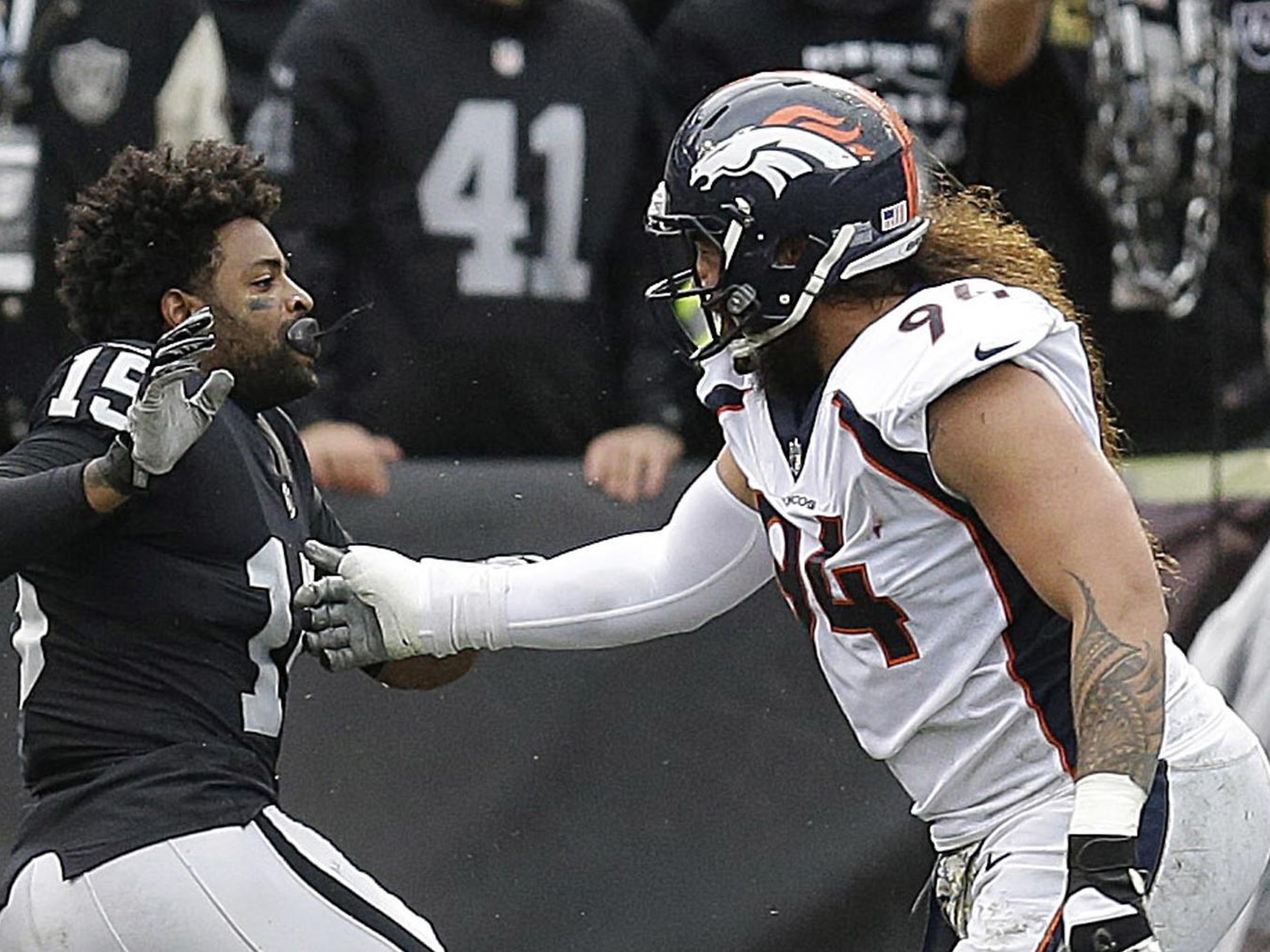 Fight Breaks Out in Raiders-Broncos Game Between Crabtree and Talib